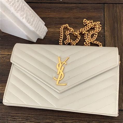 ysl clutch bag nude sales|Yves Saint Laurent Clutches .